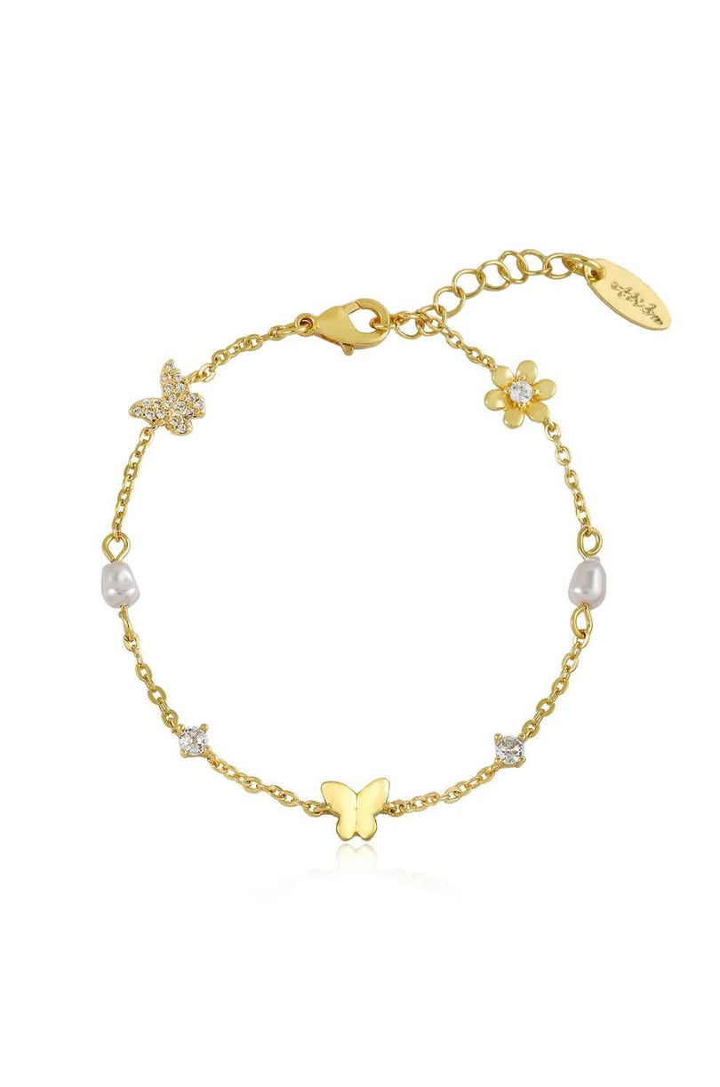 Gold butterfly and pearl bracelet on white background