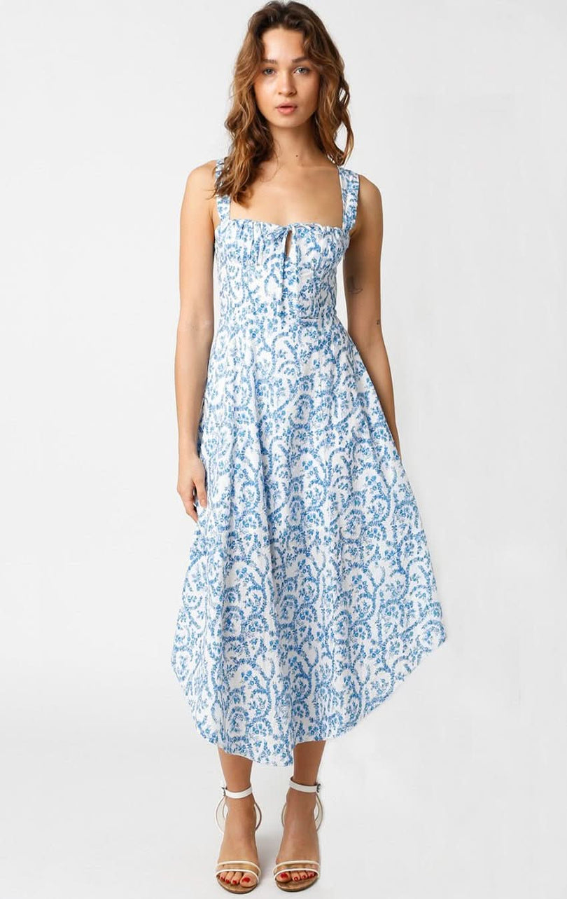The Ios White and Blue Floral Corset Midi Dress, styled as a university graduation dress.
