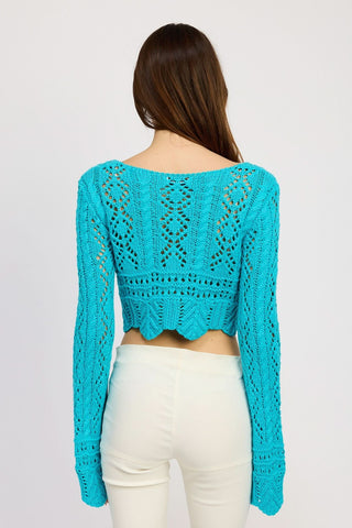 Turquoise Blue Crochet Front-Tie Crop Top Styled Over Bikini for Beach Vacation - Back View
