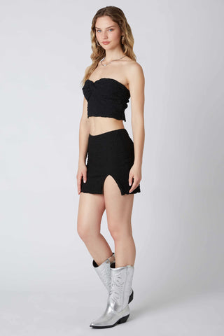 Lydia Black Mini Skirt - Side Slit View