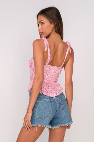 Elyse Pink Floral Peplum Top side angle view showing tie straps