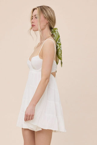 White corset-inspired mini dress with tiered skirt - side view