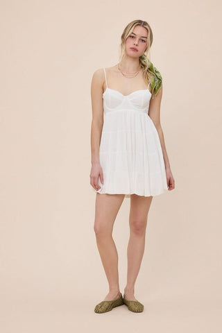 Cute white graduation mini dress with tiered ruffles