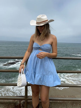 Detail of hidden built-in shorts on the chambray blue Argie romper dress
