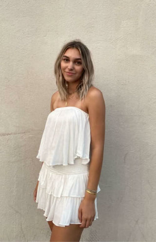 Monaco White Strapless Romper styled as a vacation outfit