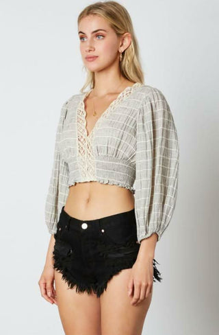 beige and black striped crop top side view relaxed fit