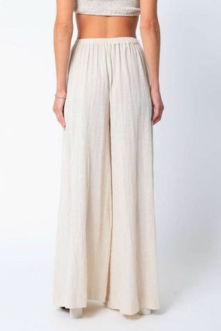 Beige resort wear pants set back view