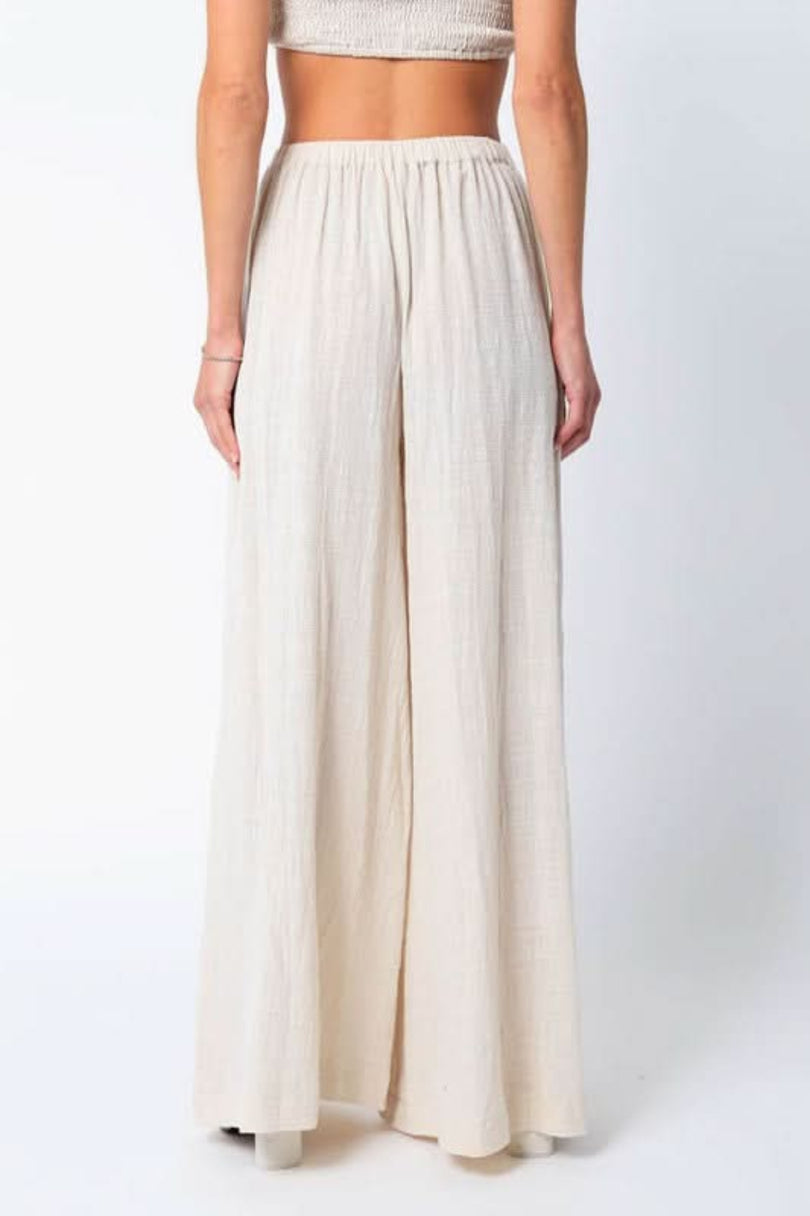 Beige resort wear pants set back view