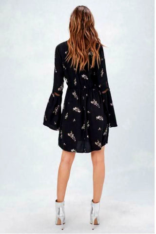 back view of black floral shift dress long sleeve back view relaxed boho fit