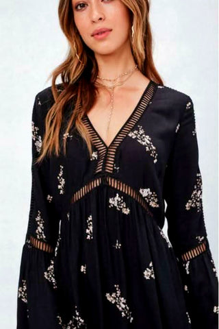 black floral dress v neckline lattice trim detail bell sleeve close up