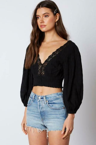 black lace crop top side view fitted silhouette