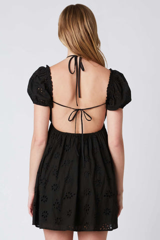 Black cotton eyelet mini dress back view