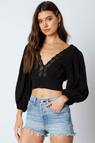 black puff sleeve crop top smocked waist detail