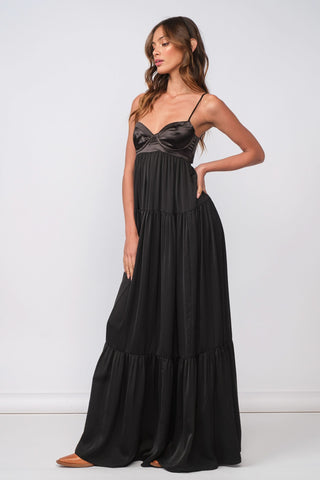 Elegant black satin tiered maxi dress with romantic silhouette