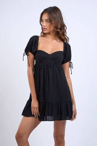Harleigh Black Puff Sleeve Babydoll Mini Dress front detail view | Boho Pink