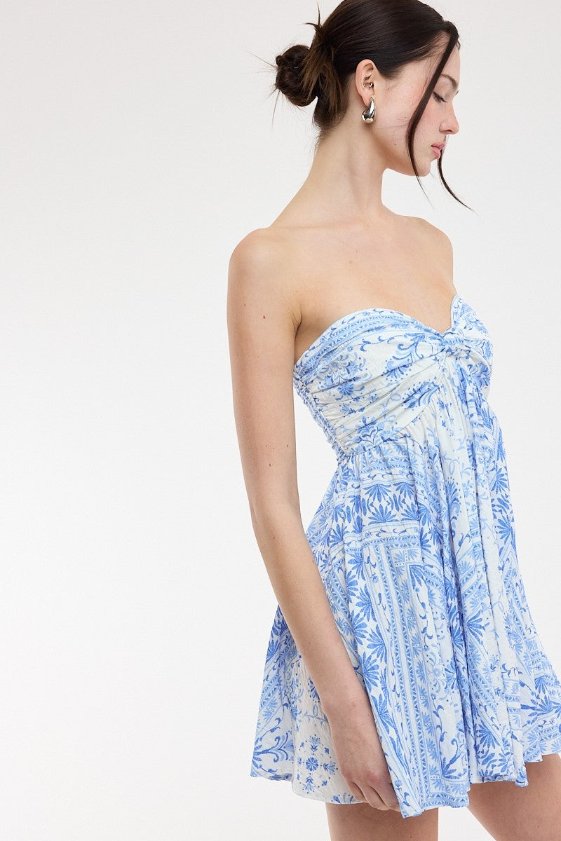 Blue and white floral babydoll dress with flowy silhouette