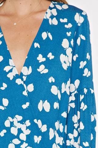 Blue and White Long Sleeve Wrap Top Detail View