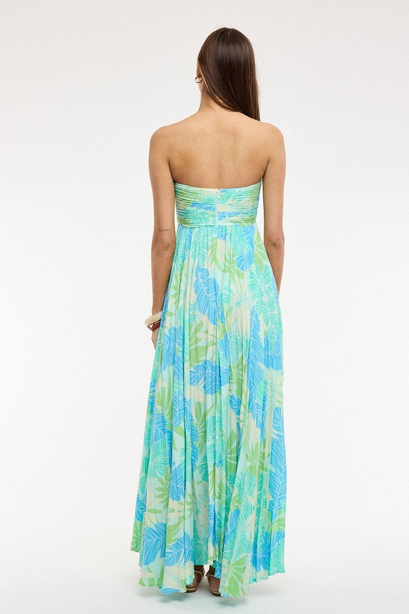 Back view of blue green tropical print strapless maxi dress