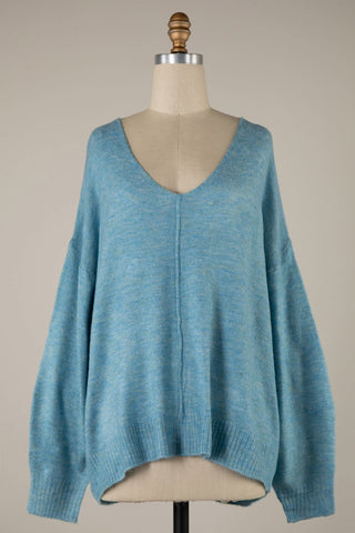 Blue oversized V-neck knit pullover sweater detailed view
