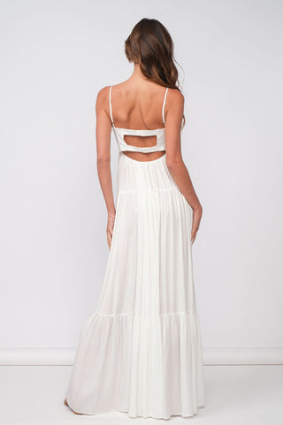 Back view of white satin tiered maxi gown with elegant drape