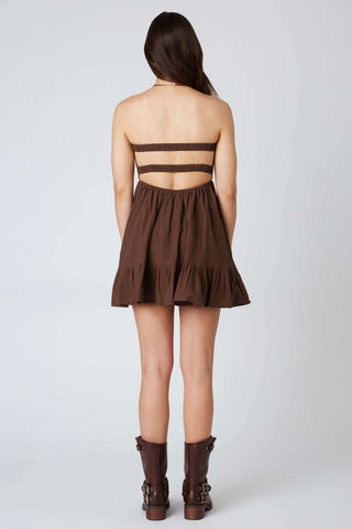 Back view of brown strapless romper dress showing elastic straps and open back | Boho Pink
