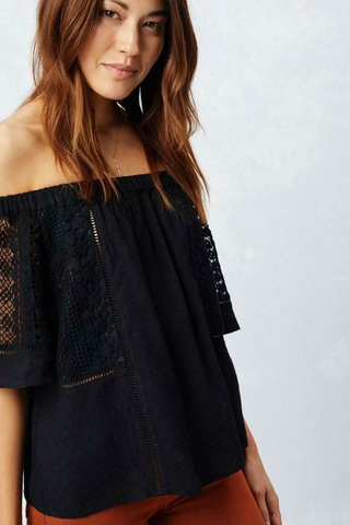 Black off the shoulder lace top with crochet sleeves angled view