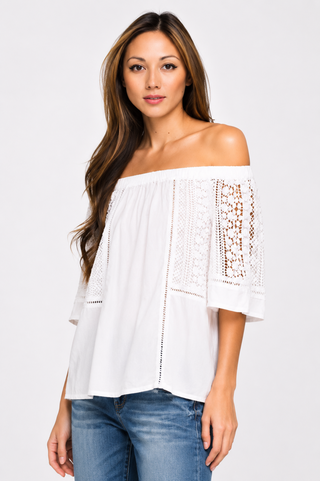 White off shoulder blouse with lace sleeves angled view
