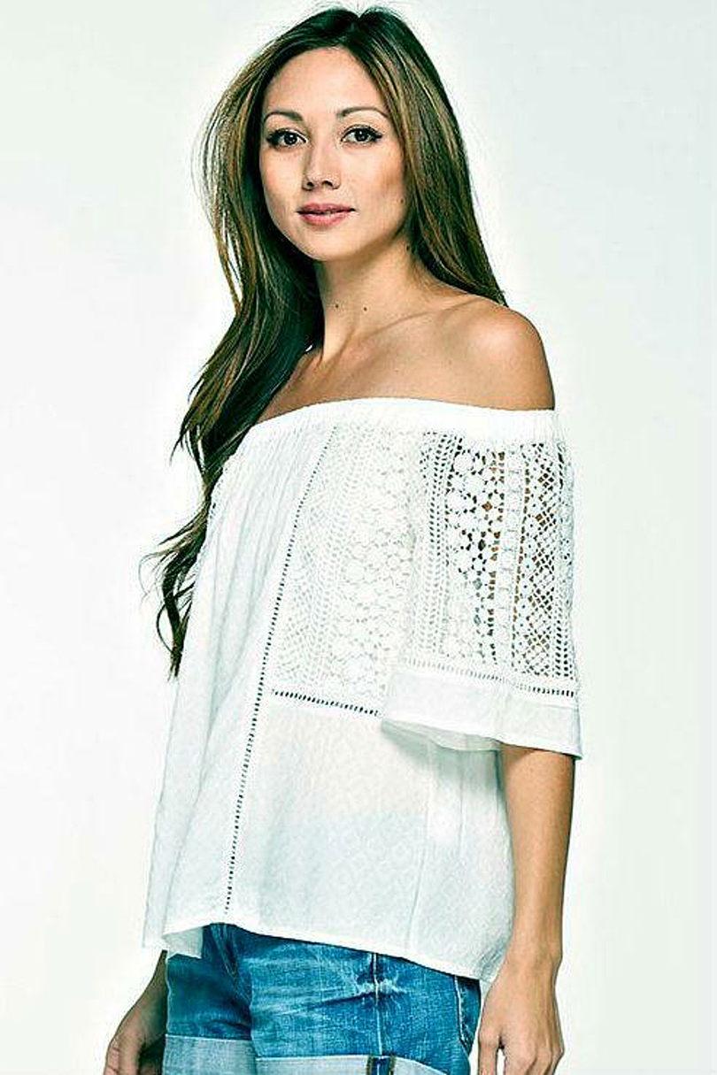 White off shoulder blouse with lace sleeves angled view