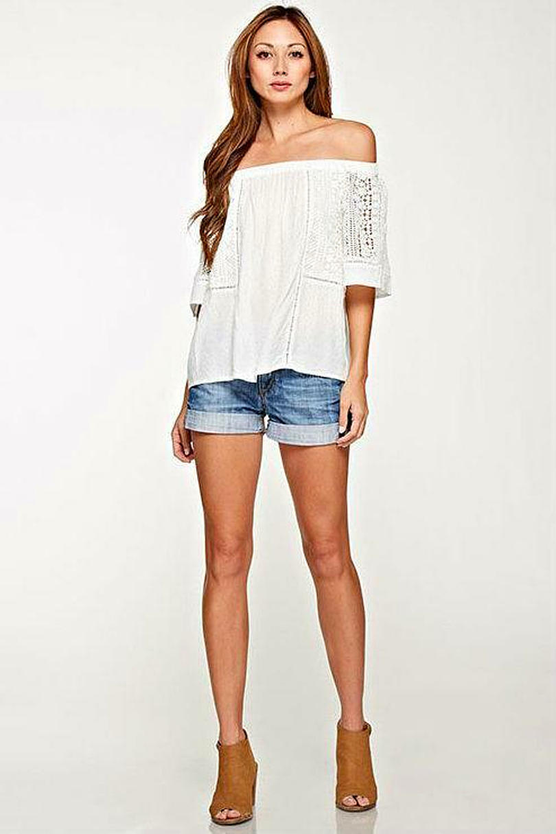 White off the shoulder top with crochet lace detail front view