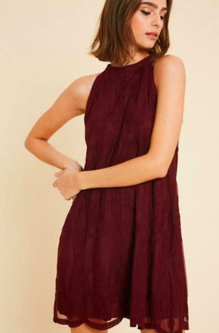 Burgundy scalloped hem lace dress close up