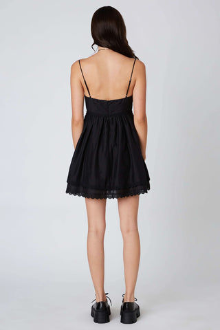 Black fit and flare mini dress back view