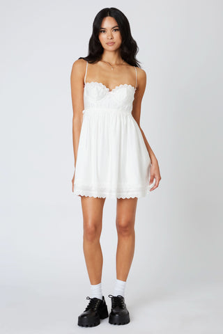 White bustier fit and flare mini dress front view