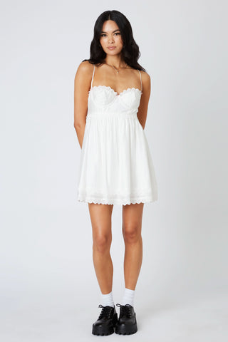 White bustier mini dress with lace trim