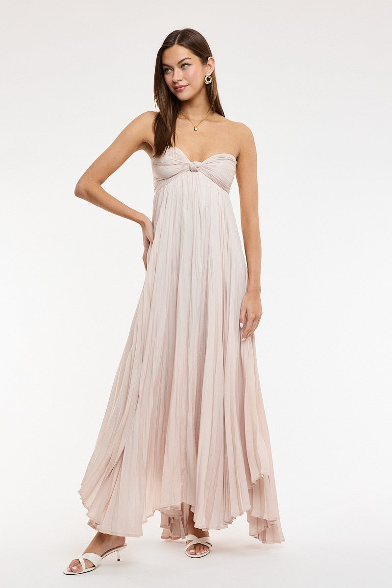 The Willow Champagne Strapless Maxi Dress, a formal champagne gown for wedding guests