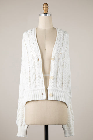 Oversized chunky white knit cardigan with drop shoulder and V-neckline