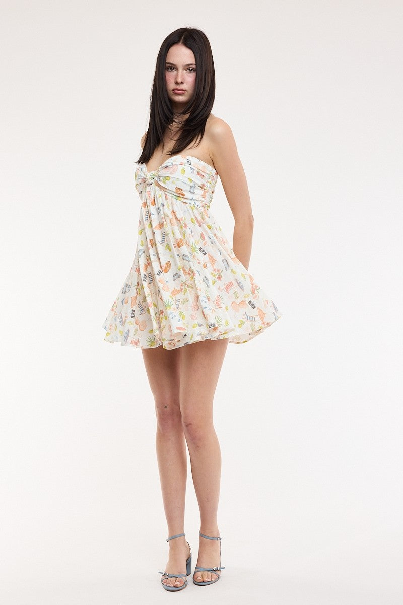 Full body view of the Colette Vacation Print Dress styled with heels for a Euro summer night out