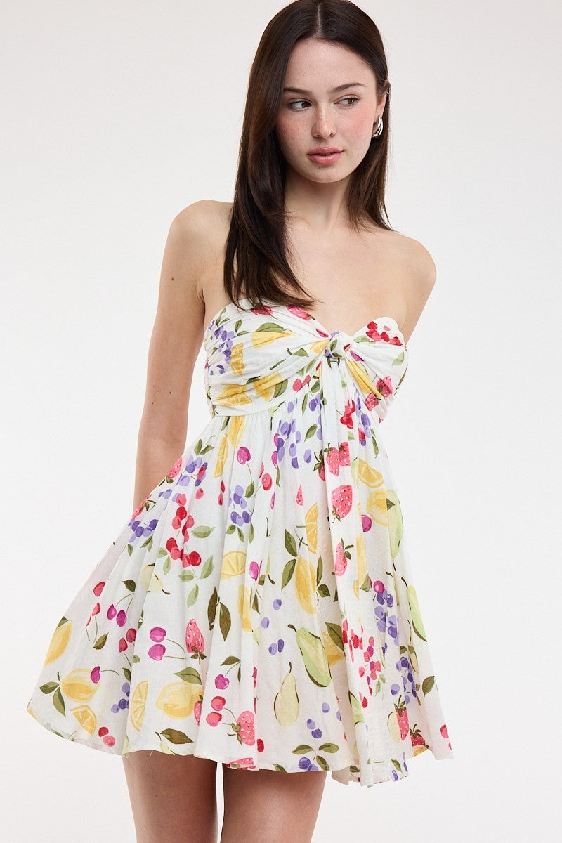 Colette White Fruit Print Strapless Babydoll Dress with a twisted knot bodice