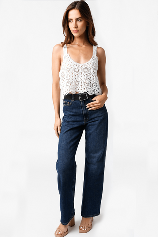 White boho crochet top styled with high waisted jeans
