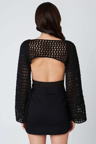 black crochet shrug back view wide sleeves