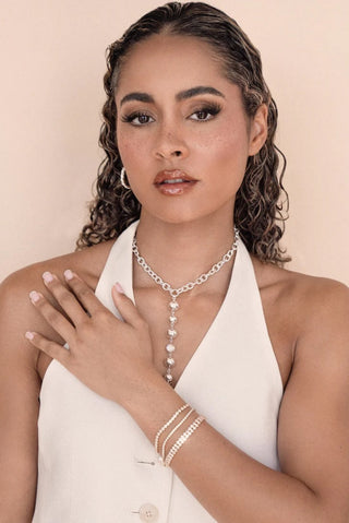 Ettika adjustable gold crystal bracelet styled on model