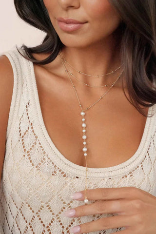Front view of the Ettika Coastal Pearl Lariat