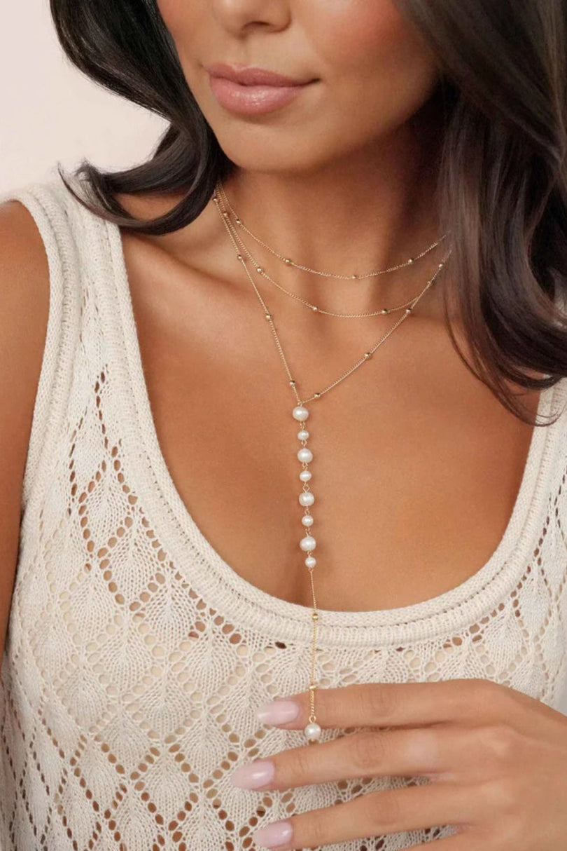Front view of the Ettika Coastal Pearl Lariat