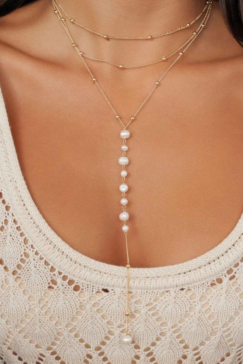 Close-up of the Ettika pearl lariat drop necklace