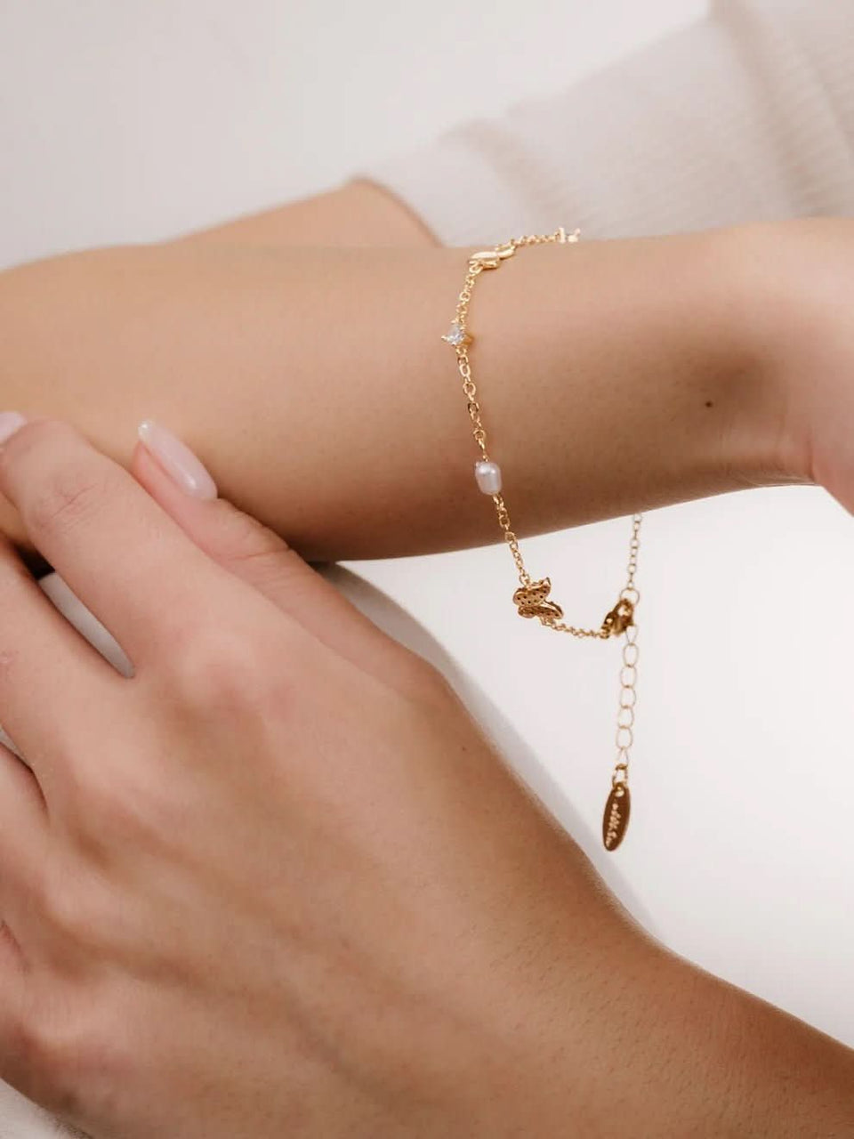 Butterflies and pearl bracelet
