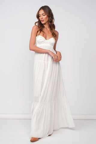White satin tiered maxi dress with flowy formal silhouette
