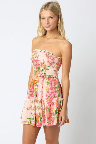 Pink floral smocked mini dress side angle