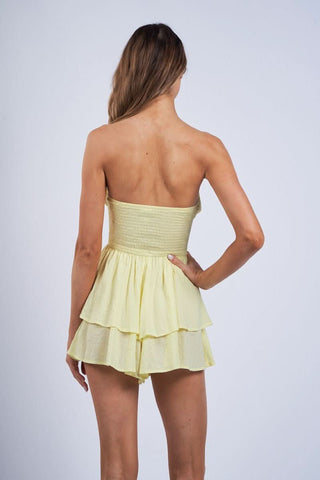Gigi Yellow Strapless Romper Dress back view showing tiered ruffle bottom