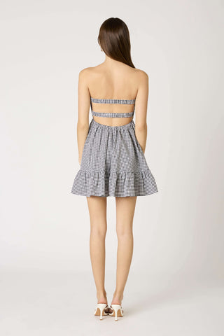 Back view of the black gingham strapless romper dress with stretchy elastic open back
