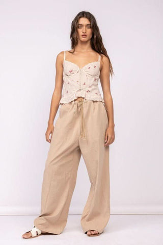 Hard to Ignore Serenity Floral Corset Top styled with linen pants and sandals
