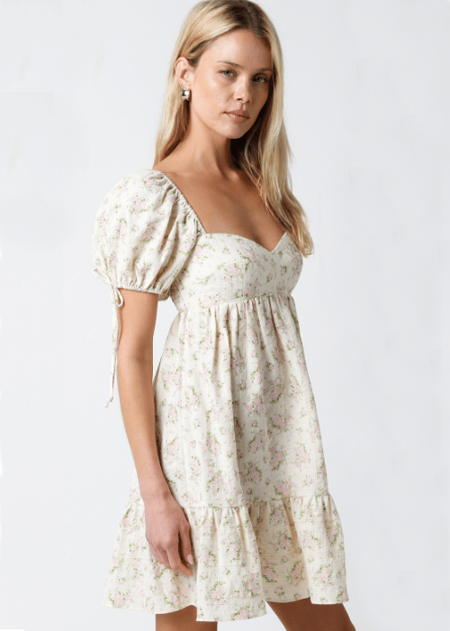 Jessie Cream and Pink Floral Babydoll Mini Dress styled as a graduation dress